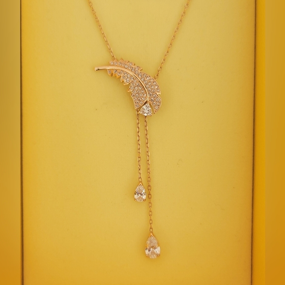 Swarovski Idyllia Y Feather Pendant Necklace Rose Gold Tone Plated - Picture 4 of 11